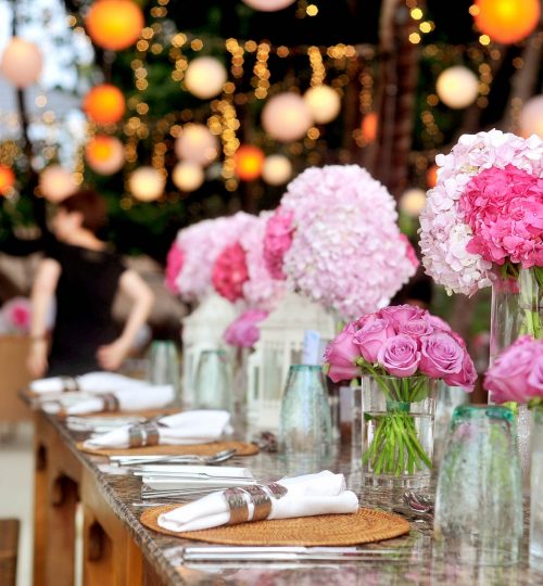 table-with-plates-and-flowers-filed-neatly-selective-focus-169190